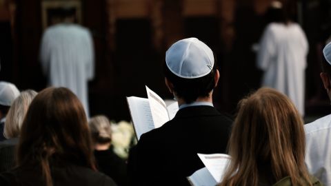 Worshippers at Yom Kippur religious services during Temple Emanu-El's first-ever service in Central Park in 2021 in New York City. The service, which was held at Central Park's SummerStage, marked the Jewish Day of Atonement.