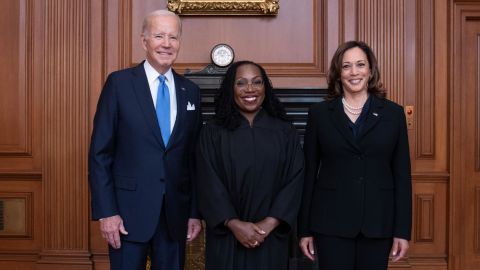 Justice Ketanji Brown Jackson poses with President Joe Biden and Vice President Kamala Harris on Friday.