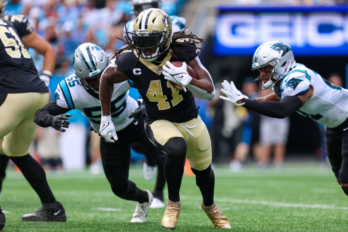 Alvin Kamara (41) of the New Orleans Saints runs the ball against the Carolina Panthers.