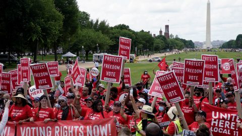 Activists march on the National Mall in Washington, DC, on June 26, 2021, during a rally in support of District of Columbia statehood and voting rights.