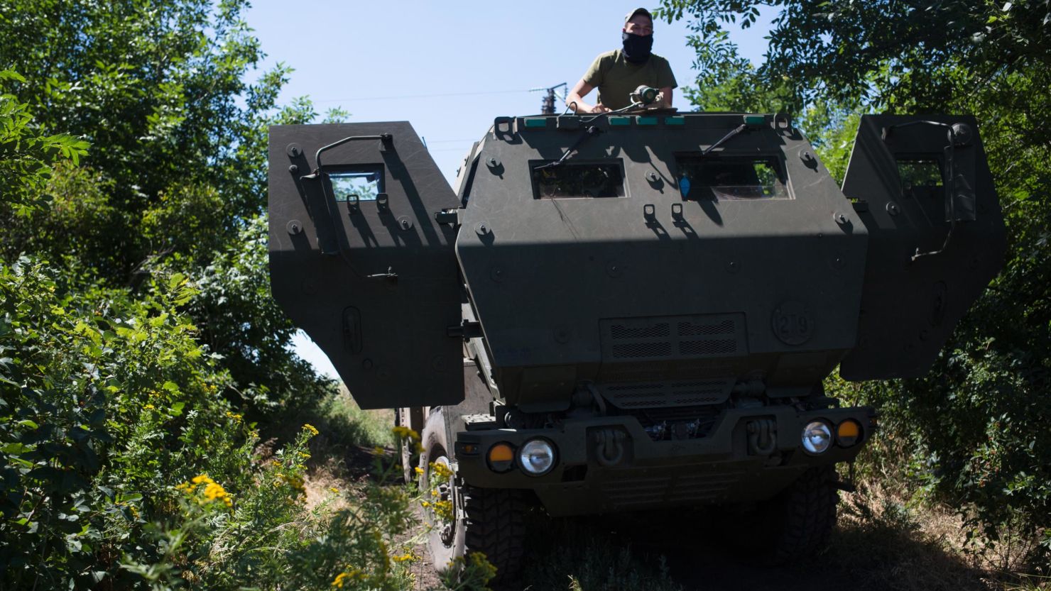 A Ukrainian serviceman operating a HIMARS in July 2022 in Eastern Ukraine. 