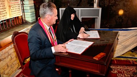 Steve Green, the founder and chairman of the Museum of the Bible, left, is pictured with the Right Reverend Abbess Geronitissa Antonini of Kosinitza Monastery.