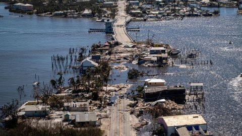Aerial photos taken Friday show the only access to the Matlacha neighborhood, which was destroyed in the aftermath of Hurricane Ian in Fort Myers, Florida. 