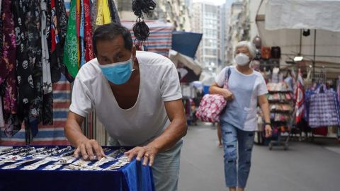 Mr. Chan at his stall in the Hong Kong Ladies' Maket.