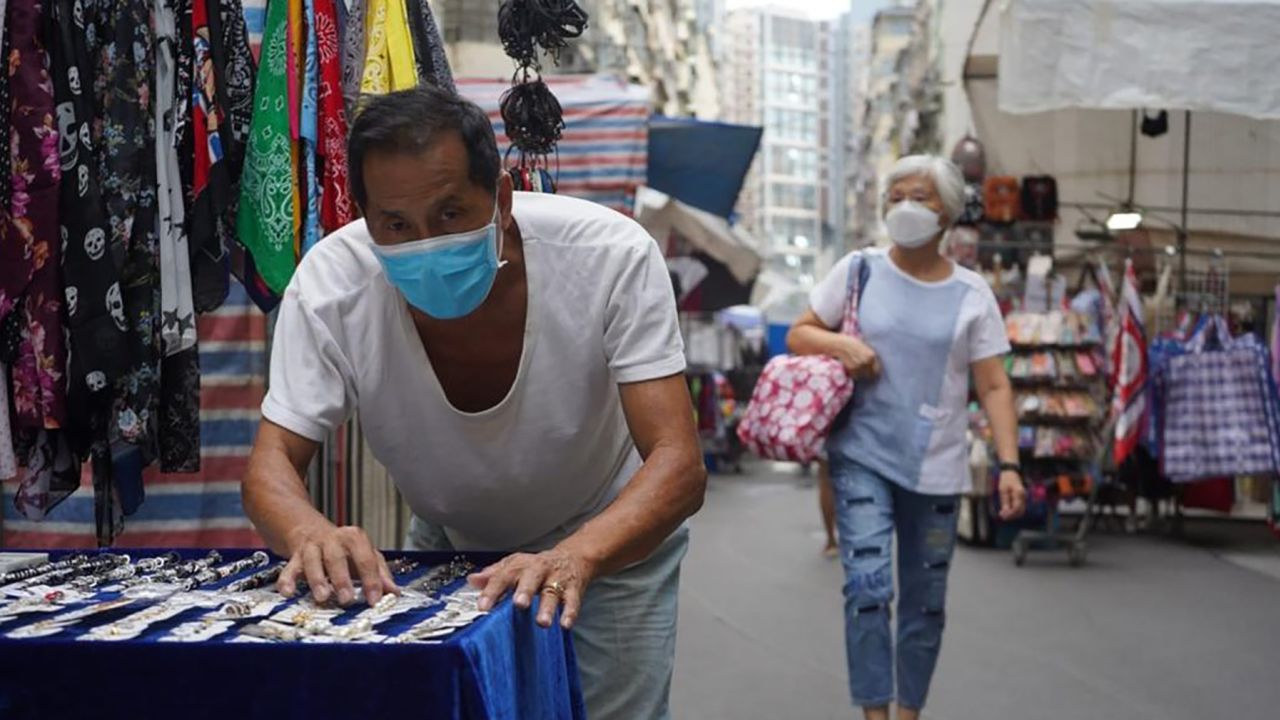 Mr. Chan at his stall in the Hong Kong Ladies' Maket.