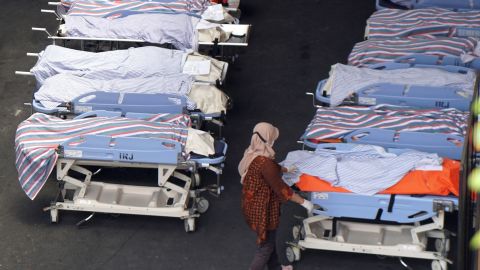 Riot victims are pictured at Saiful Anwar hospital following the riot.