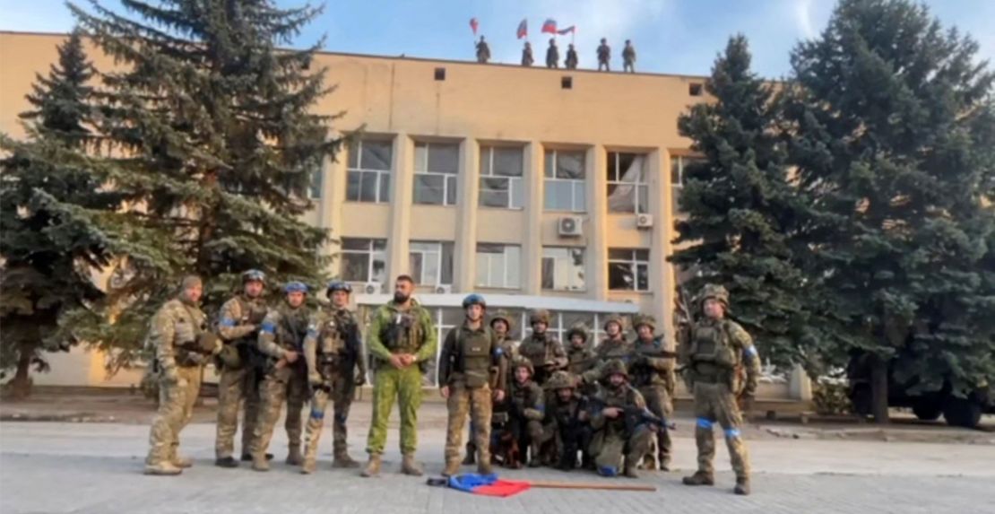 Ukrainian armed forces make a statement in front of Lyman Town Administration office, in Lyman, Ukraine, in this still image taken from a social media video, released on October 1.