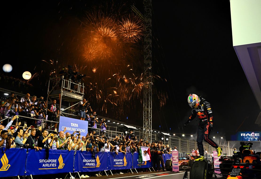 Sergio Perez celebrates in parc ferme during the F1 Grand Prix of Singapore at Marina Bay Street Circuit.