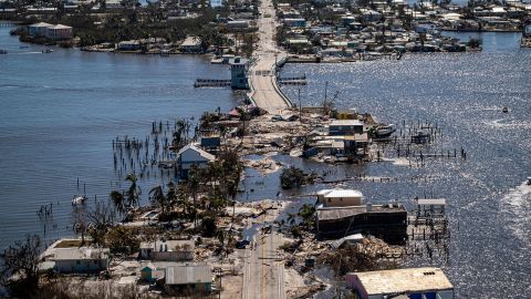 An aerial picture taken on September 30, 2022 shows the only access to the Matlacha neighborhood destroyed in the aftermath of Hurricane Ian in Fort Myers, Florida. 