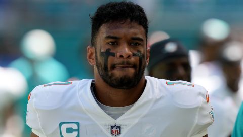 Tagovailoa warms up before the game against the Bills.