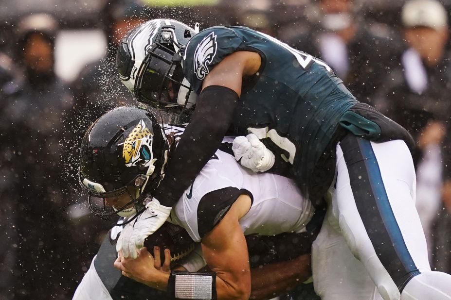 Jacksonville Jaguars quarterback Trevor Lawrence is brought down by Philadelphia Eagles linebacker Kyzir White in the second half of the Eagles' 29-21 win in Philly. The Eagles are now 4-0 after Week 4.
