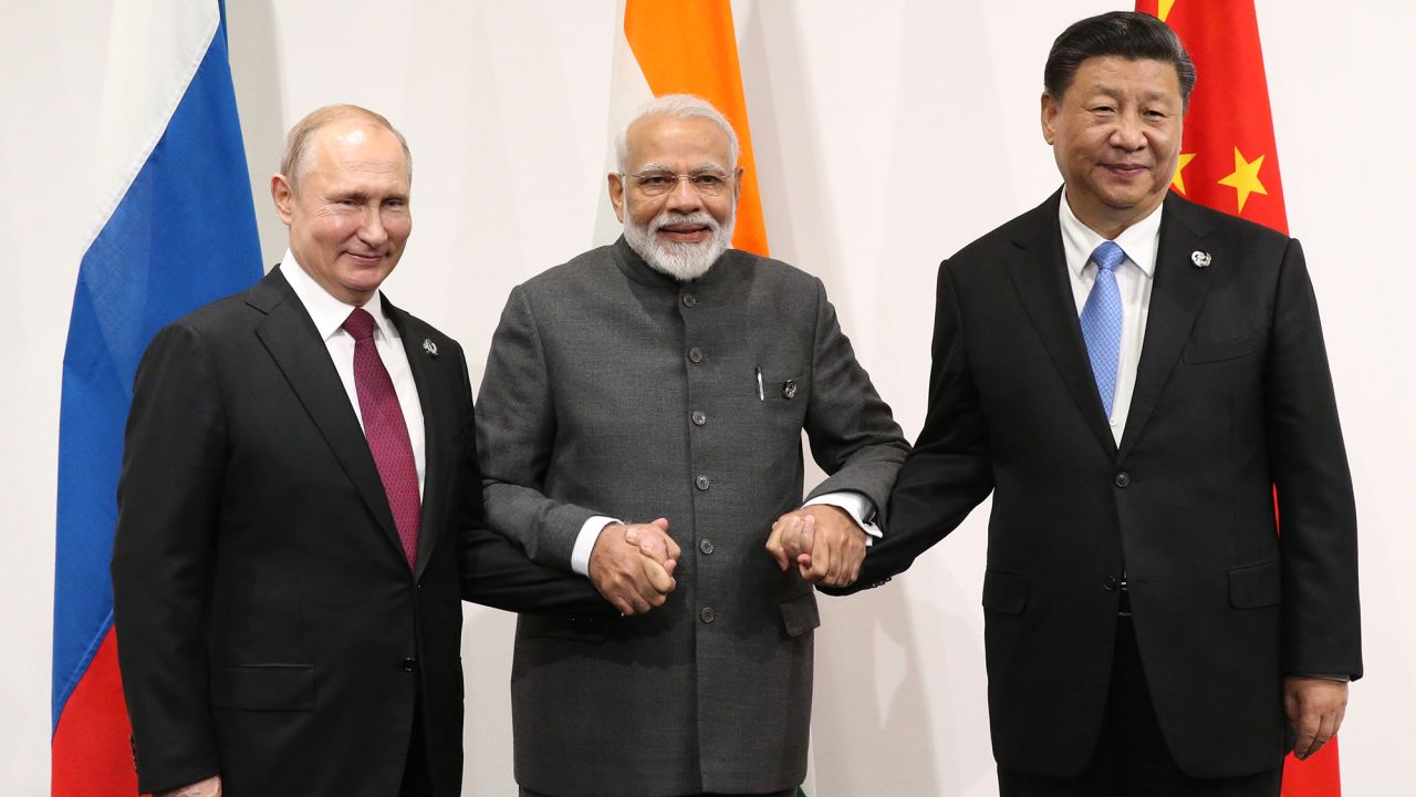 Russian President Vladimir Putin, Indian Prime Minister Narendra Modi and Chinese President Xi Jinping pose for a group photo prior to their trilateral meeting at the G20 Osaka Summit 2019 on June 28, 2019 in Osaka, Japan.