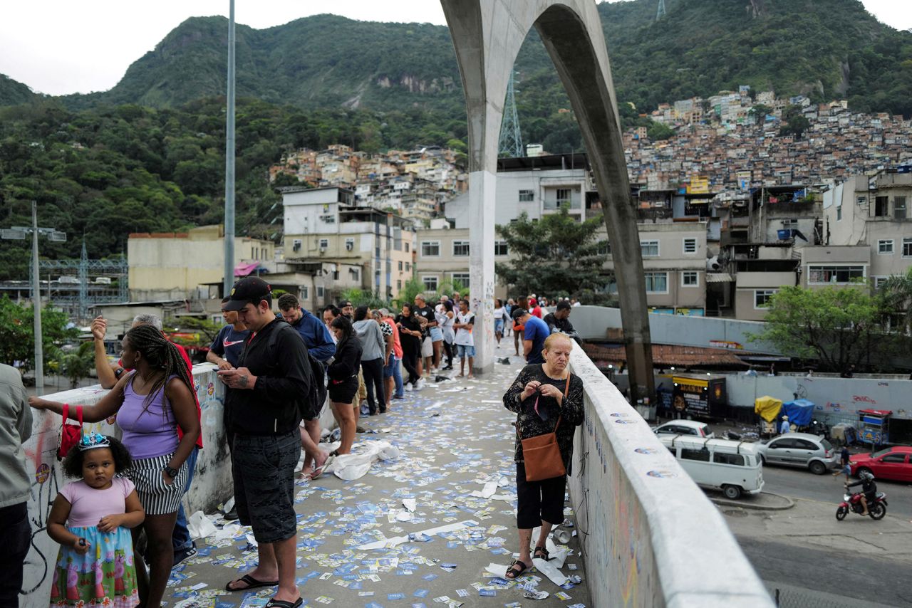 People stand in line to cast their votes in Rio de Janeiro on October 2.