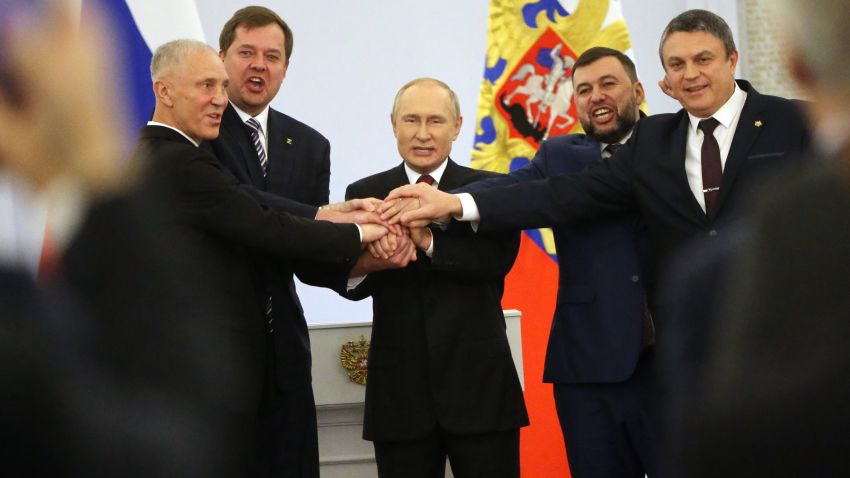 MOSCOW, RUSSIA - SEPTEMBER 30: (RUSSIA OUT) Russian President Vladimir Putin (C) with Ukrainian separatist regional leaders Vladimir Saldo (L), Yevgeniy Balitsky (2L), Leonid Pasechnik (R) and Denis Pushilin (2R) seen during the annexation ceremony of four Ukrainian regions at the Grand Kremlin Palace, September 30, 2022, in Moscow, Russia. Separatist leaders of annexed Donetsk, Lugansk, Kherson and Zaporizhzhya regions of Ukriane has arrived in Moscow to sign joint documents. (Photo by Contributor/Getty Images)