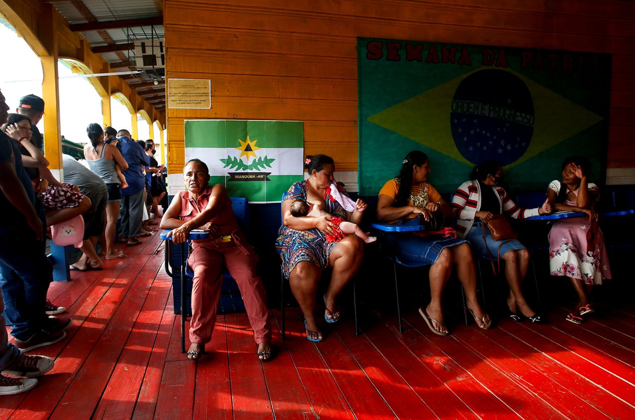 People wait to vote at a polling station in Lago de Catalao, Brazil, on October 2.
