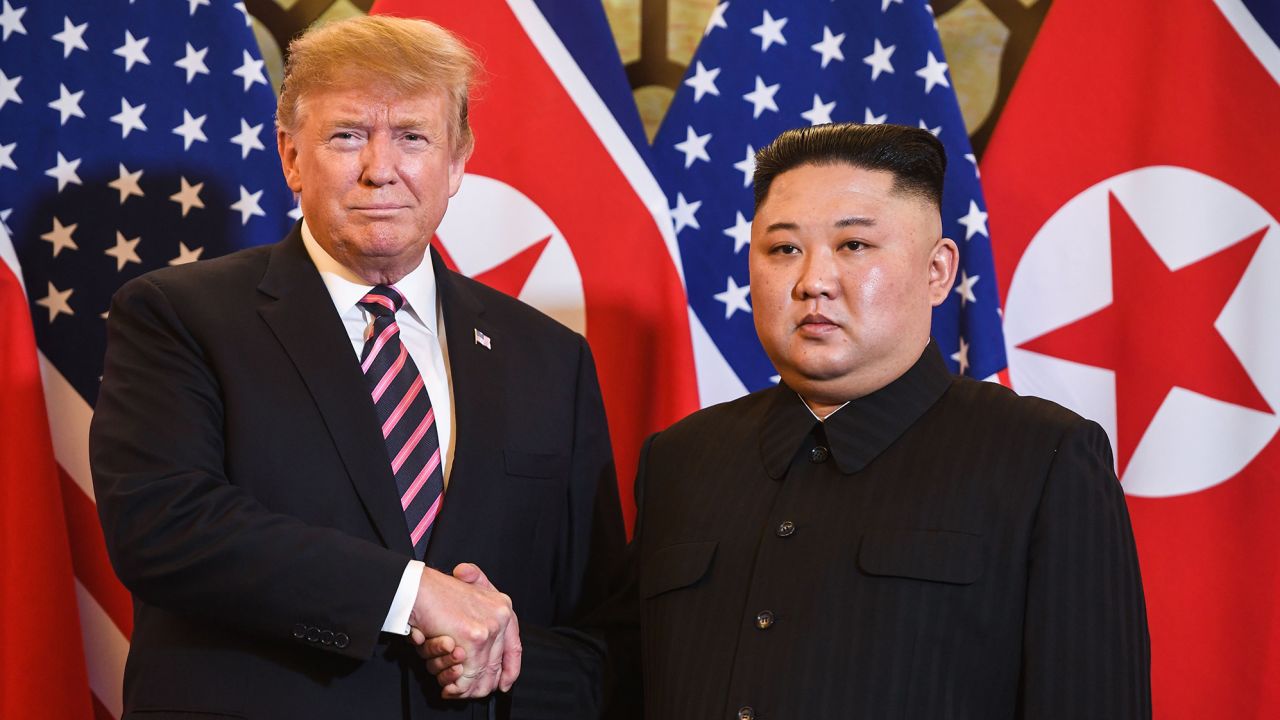 US President Donald Trump shakes hands with North Korea's leader Kim Jong Un before in Hanoi on February 27, 2019
