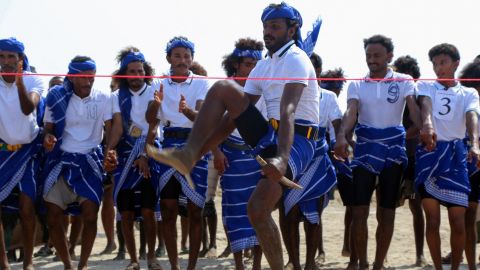 Members of Yemen's al-Zaraniq tribe from the Mokha area take part in a jumping contest during a traditional athletics festival in the Khokha region of the country's war-ravaged western province of Hodeida, on Saturday.