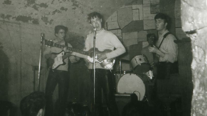 A rare image showing (L-R) George Harrison, Paul McCartney and John Lennon. Drummer Pete Best is partially visible. A rare image showing (L-R) George Harrison, Paul McCartney and John Lennon. Drummer Pete Best is partially visible.