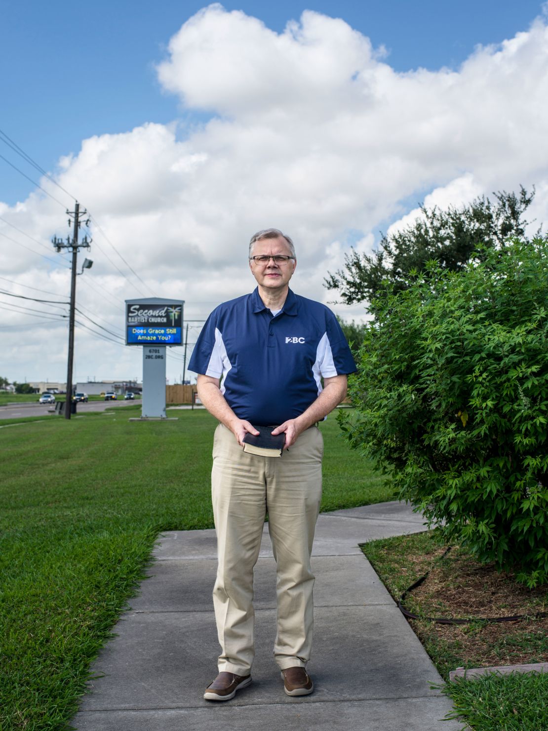Pastor Dana Moore, seen in 2021 outside Second Baptist Church in Corpus Christi, Texas, began visiting John Ramirez in 2017. "It's one of my church members. Am I not going to go see him?"