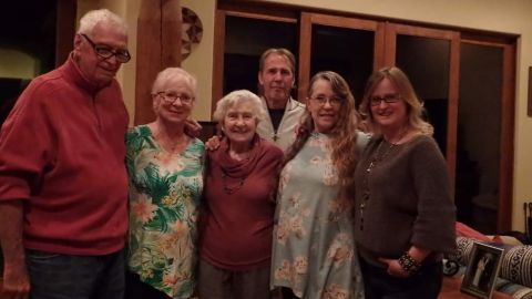 Linda stands with her family on Christmas Eve in 2021 in Corrales, New Mexico: (from left) Bob Herms, Eileen Herms, Brenda Stewart, Dale Stewart, Linda Stewart and Kim Stewart.