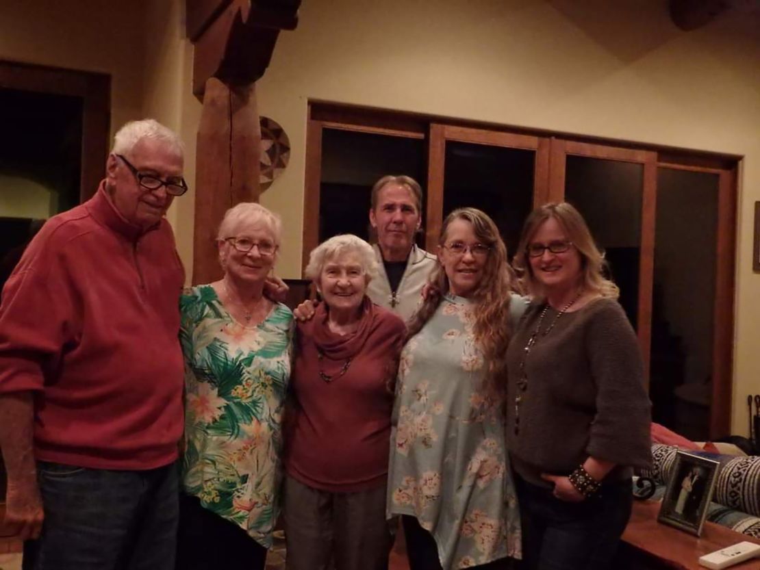 Linda stands with her family on Christmas Eve in 2021 in Corrales, New Mexico: (from left) Bob Herms, Eileen Herms, Brenda Stewart, Dale Stewart, Linda Stewart and Kim Stewart.