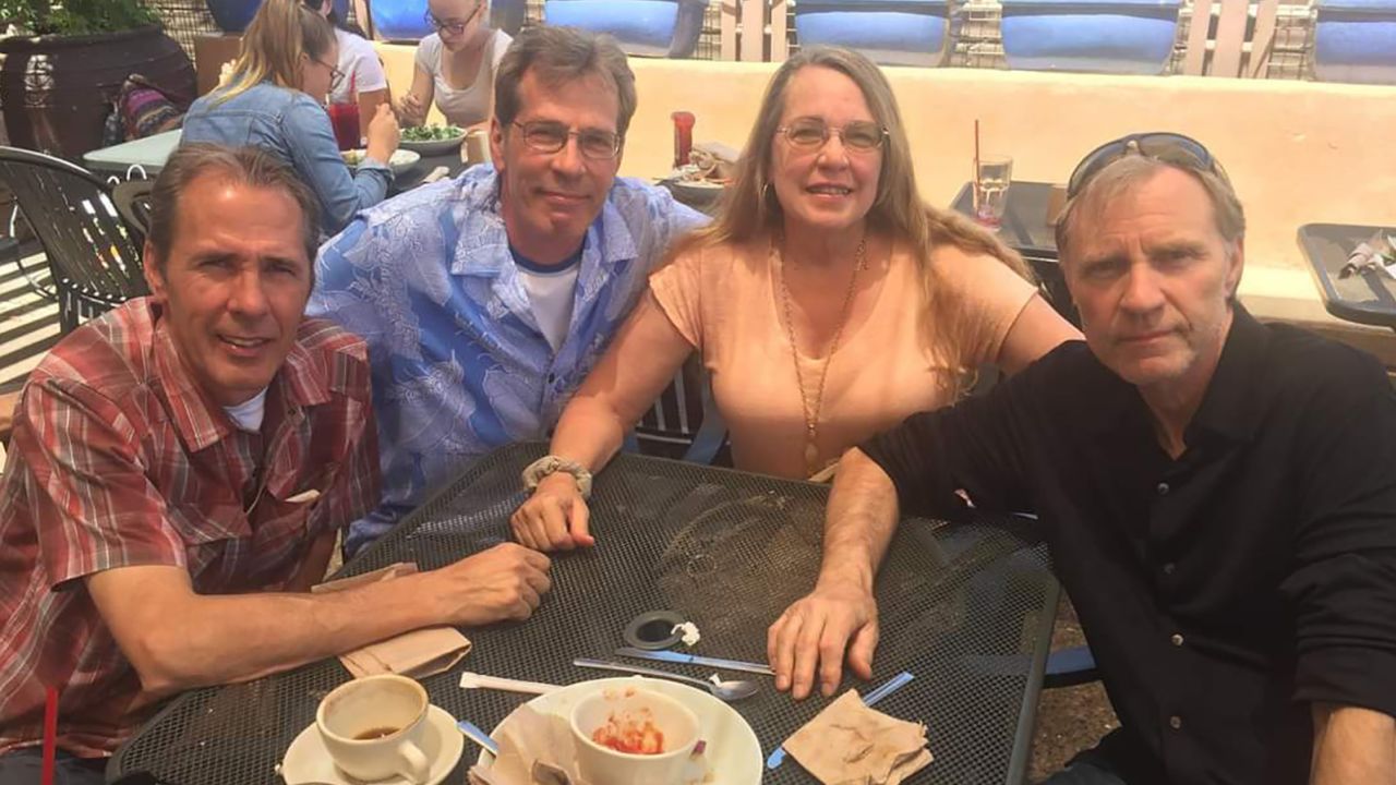 Linda sits with her siblings (from left) Dale Stewart, Jim Harris, Glenn Harris in Albuquerque, New Mexico, in September 2018.