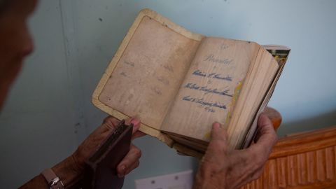 This Bible was given to Pat Pickett in 1950 and she tried to save it in the storm.