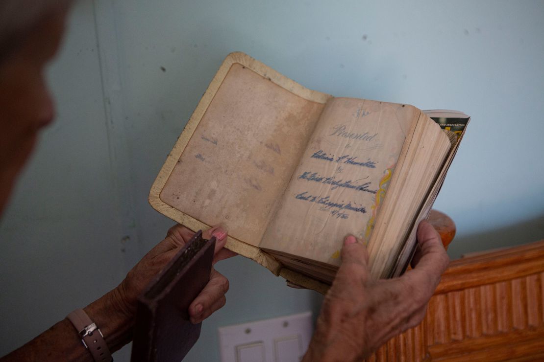 This Bible was given to Pat Pickett in 1950 and she tried to save it in the storm.