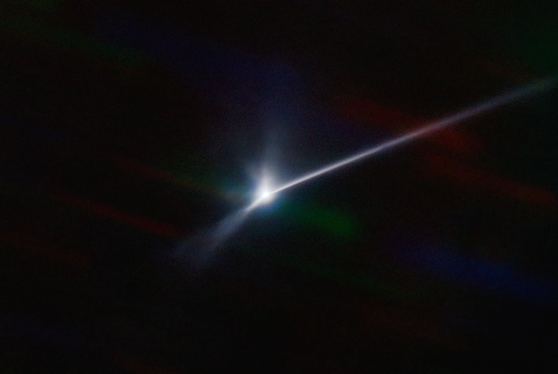 The SOAR telescope image shows a comet-like trail of debris from Dimorphos after the collision. 