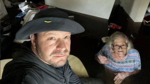 Johnny Lauder said he ventured through Hurricane Ian's floodwaters to reach his mother after her home began to fill with water.