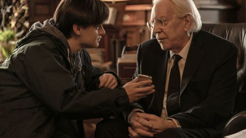 Jaeden Martell and Donald Sutherland in the Stephen King adaptation 'Mr. Harrigan's Phone.'