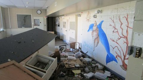Debris litters Fort Myers Beach Elementary in this photo released by the school district Monday.