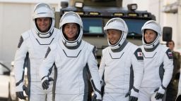 NASA astronauts Josh Cassada, left, and Nicole Mann, second from left, Japan Aerospace Exploration Agency (JAXA) astronaut Koichi Wakata, second from right, and Roscosmos cosmonaut Anna Kikina, right, wearing SpaceX spacesuits, are seen as they prepare to depart the Neil  A. Armstrong Operations and Checkout Building for Launch Complex 39A during a dress rehearsal prior to the Crew-5 mission launch, Sunday, Oct. 2, 2022, at NASA's Kennedy Space Center in Florida. NASA's SpaceX Crew-5 mission is the fifth crew rotation mission of the SpaceX Crew Dragon spacecraft and Falcon 9 rocket to the International Space Station as part of the agency's Commercial Crew Program. Mann, Cassada, Wakata, and Kikini are scheduled to launch at 12:00 p.m. EDT on Oct. 5, from Launch Complex 39A at the Kennedy Space Center. 