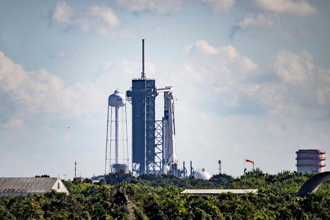 The SpaceX Falcon 9 rocket with the aerospace company's Crew Dragon spacecraft rests at launch pad 39A on October 3. 