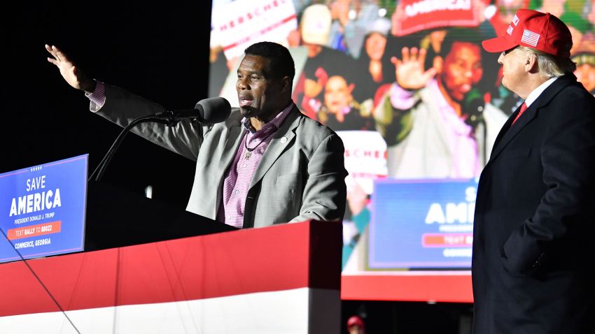 October 4, 2022: In this photo from March 26, 2022, Herschel Walker, the front-runner for the partyÃ¢â‚¬â„¢s U.S. Senate nominee, speaks as former President Donald Trump looks during a rally for Georgia GOP candidates at Banks County Dragway in Commerce. (Credit Image: © Hyosub Shin/The Atlanta Journal-Constitution via ZUMA Press Wire)