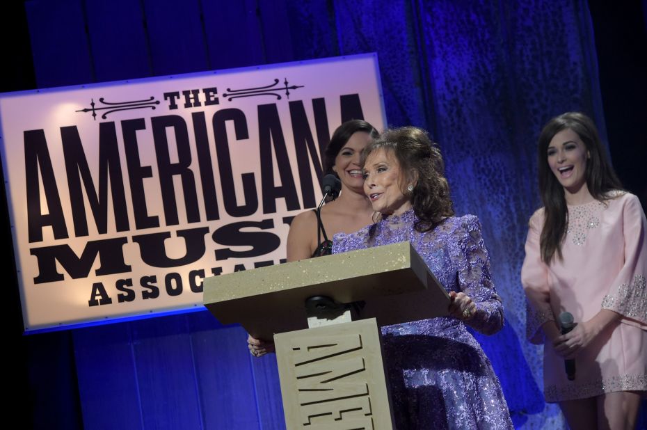 Lynn accepts the Lifetime Achievement Award for Songwriting at the Americana Music Association Honors and Awards Show at the Ryman Auditorium in Nashville in 2014. 