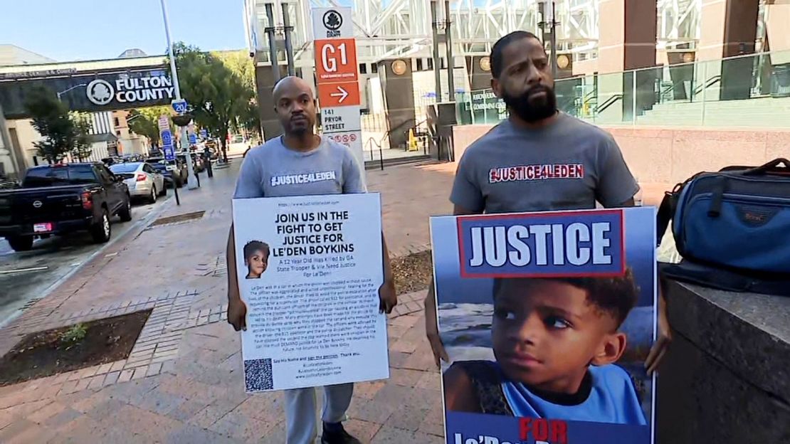 Anthony Boykins', right,  12-year-old was killed in a crash when a Georgia State Trooper executed a pit maneuver on the car in which his son was a passenger.