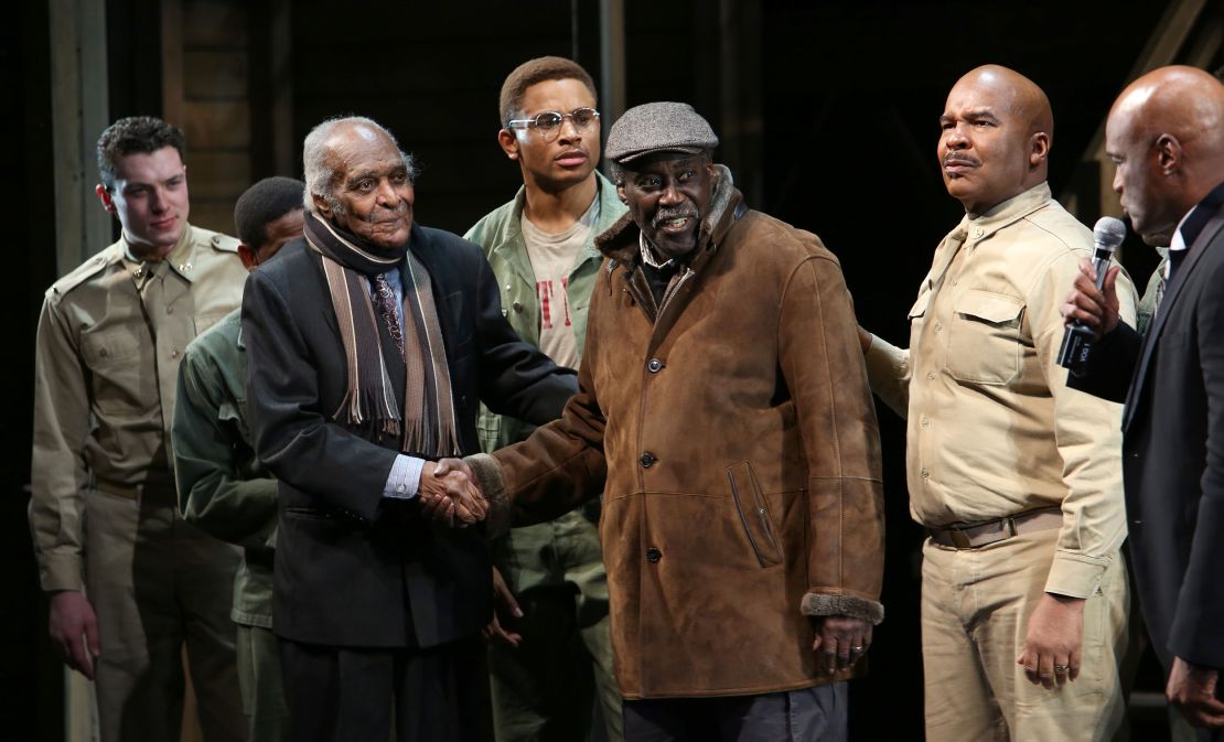 Fuller (center, in a brown coat and cap) joined the cast of the Broadway revival of "A Soldier's Play" onstage to celebrate its opening.
