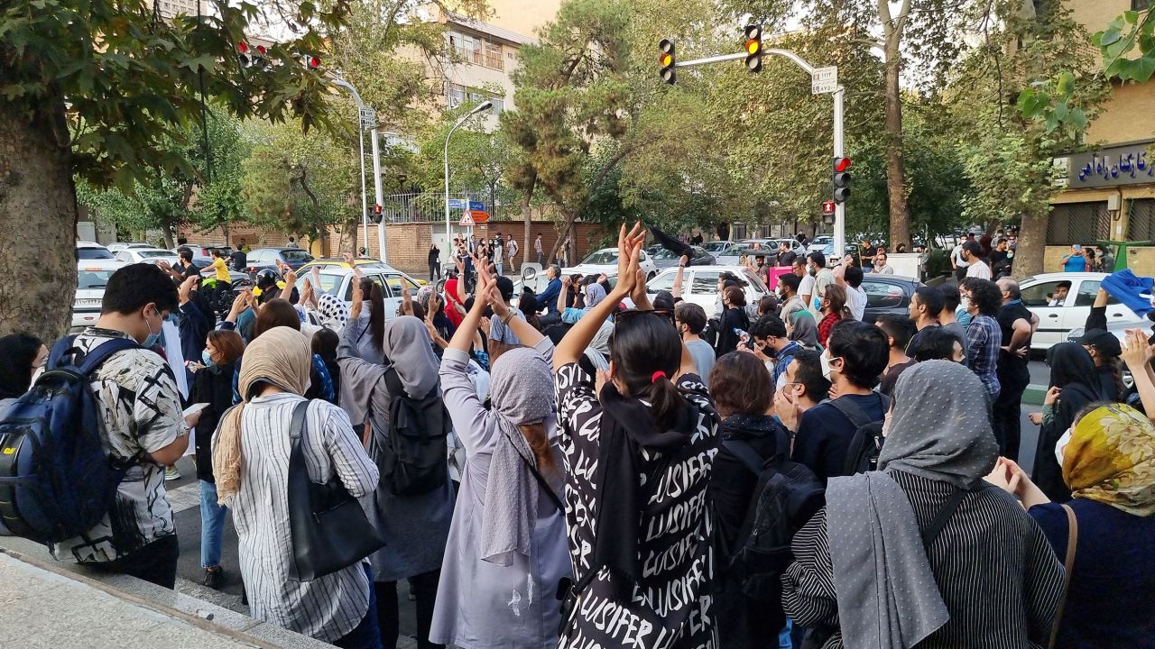 People gather in protest against the death of Mahsa Amini along the streets on September 19, 2022 in Tehran, Iran. 