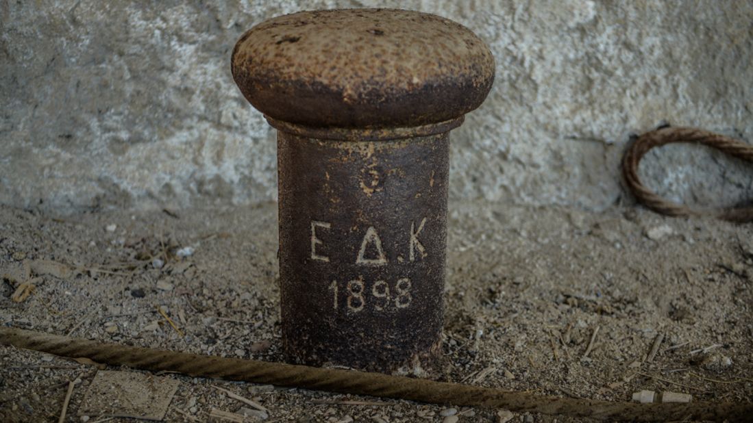 <strong>Historic project:</strong> One of the canal's first bitts (strong posts,) with the date 1898 and the initials E.D.K. (Corinth Canal Company) engraved, is still intact today.