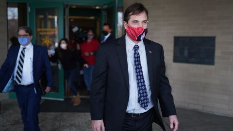 Former state health director Nick Lyon exits after making an appearance on a video arraignment at the Genesee County Jail in Flint, Michigan, on January 14, 2021.