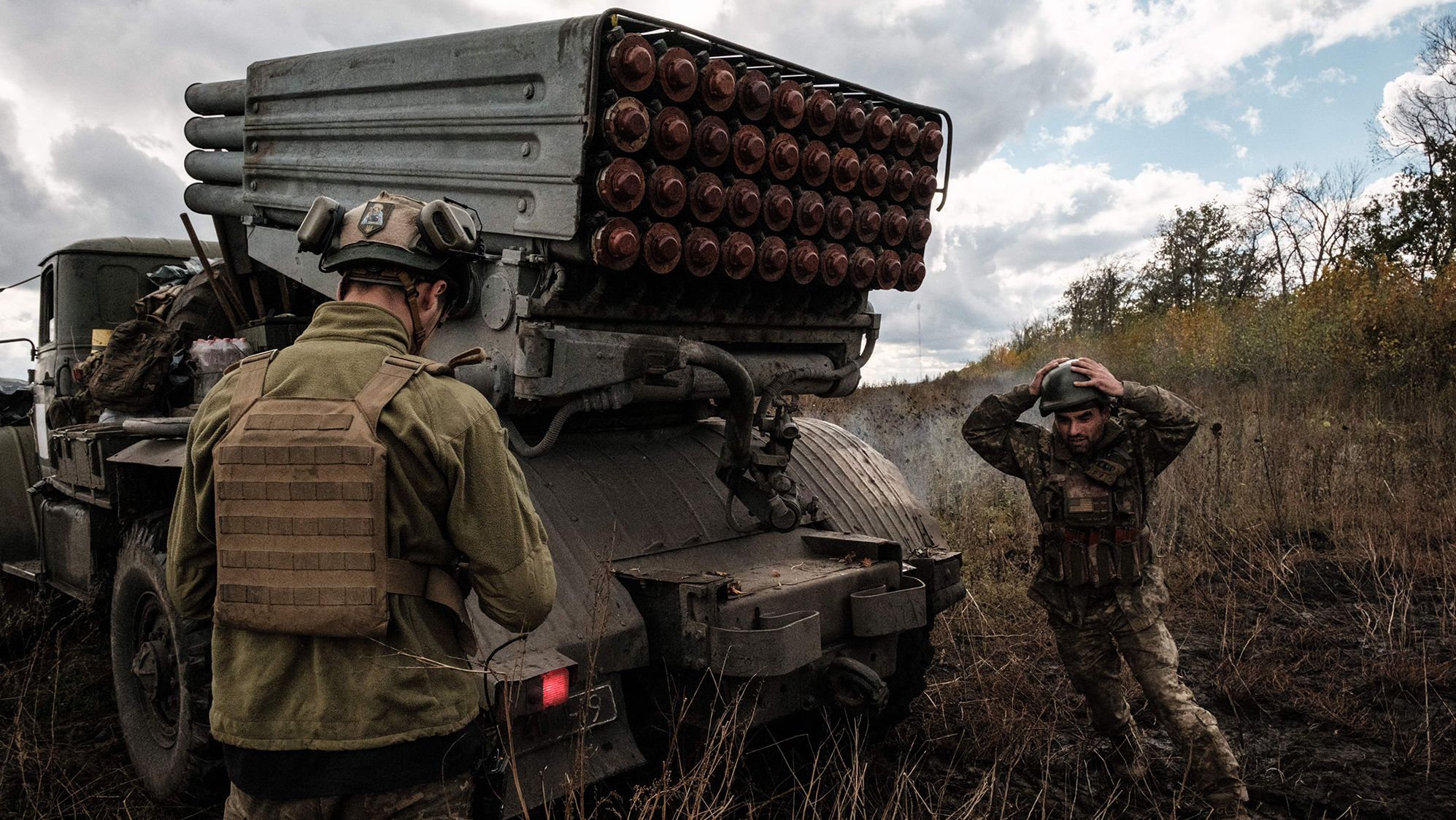 Ukrainian soldiers prepare to fire a BM-21 'Grad' multiple rocket launcher towards Russian positions in the Kharkiv region on October 4.