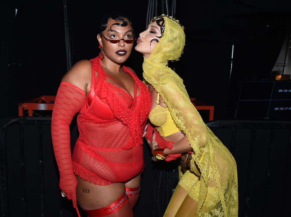 Paloma Elsesser and Bella Hadid backstage at a Savage x Fenty show in 2019.