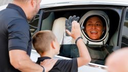 Commander Nicole Mann greets her family while departing crew quarters for launch aboard a SpaceX Falcon 9 rocket at the Kennedy Space Center in Cape Canaveral, Florida, U.S. October 5, 2022. REUTERS/Joe Skipper