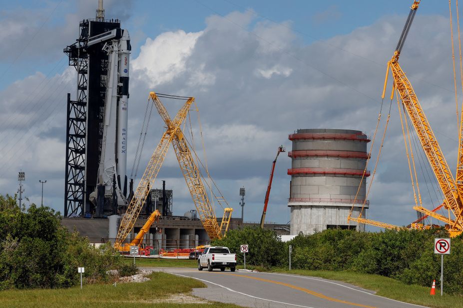 The SpaceX Falcon 9 rocket with the Crew Dragon spacecraft sits on the launch pad at the Kennedy Space Center in Florida on Tuesday, October 4.