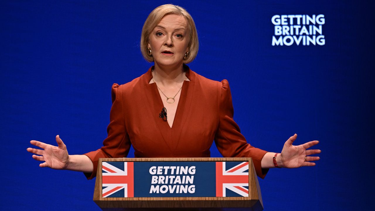 Liz Truss is pictured delivering her keynote address at the Conservative Party conference in Birmingham.