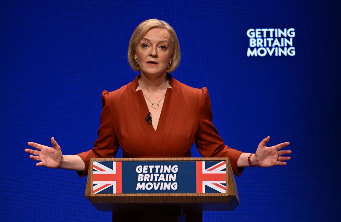 Liz Truss is pictured delivering her keynote address at the Conservative Party conference in Birmingham.