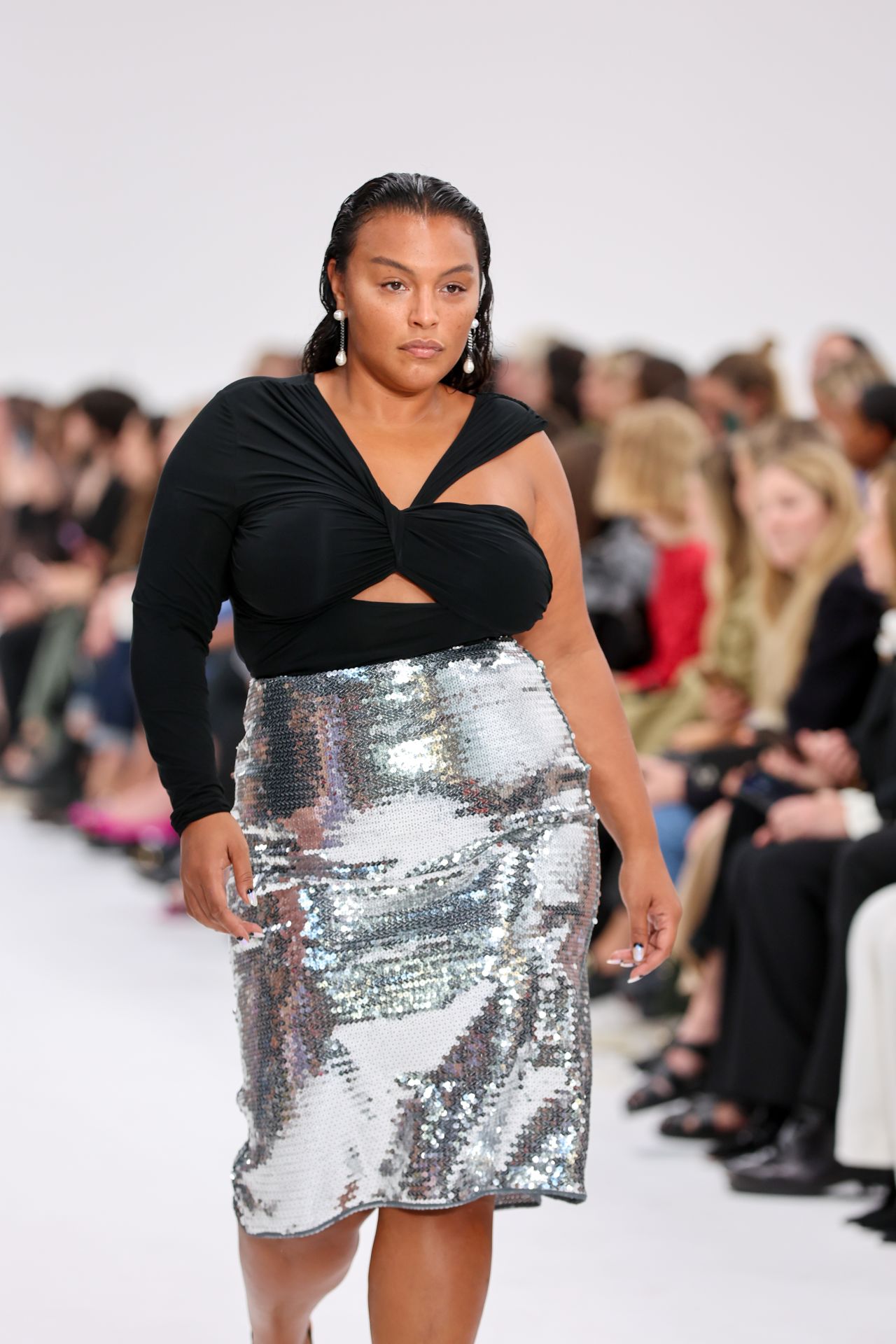 Elsesser is credited with pushing labels to be more size inclusive. Here, she walked for Nensi Dojaka's Spring-Summer 2023 show at London Fashion Week. Dojaka is offering larger sizes for the first time.