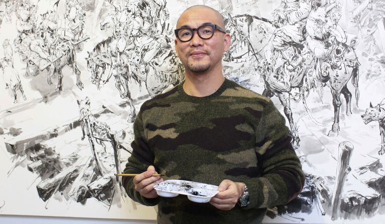 <a target="_blank">Kim Jung Gi,</a> an influential comic artist, died suddenly at the age of 47, according to his agent and his verified social media accounts on October 5. The acclaimed South Korean artist crafted sprawling, intricately detailed scenes with unbelievable speed, often before a live audience. He narrated as he worked, sharing his process with his rapt fans as he created a fully realized piece of art before their eyes.