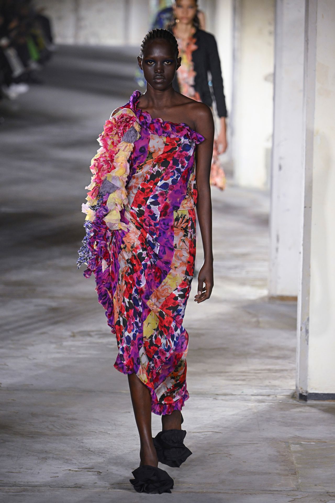 The collection's climax was a series of bright floral pieces.
